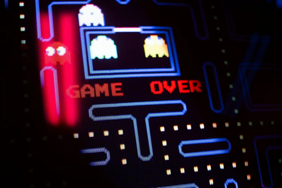 Pac-Man arcade screen showing Game Over