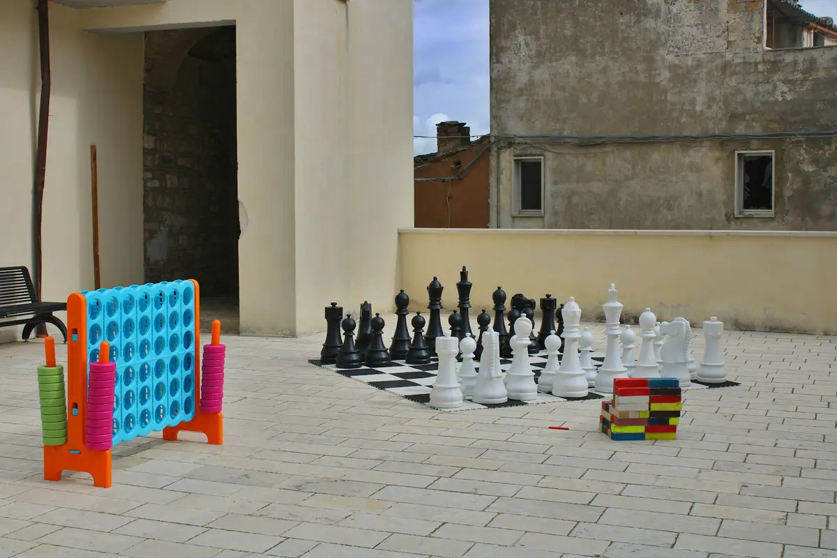 Giant Connect Four game on a patio